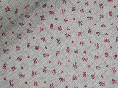 Muselina flores rojas algodón 140 cm ligera